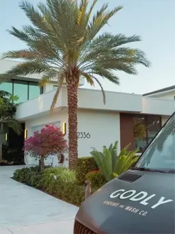 professional window cleaning team member